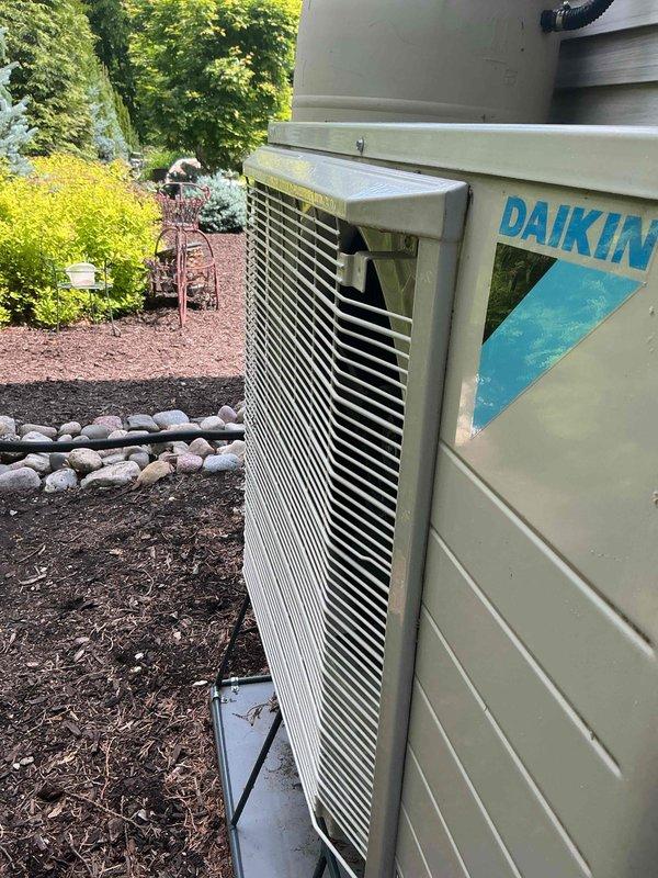 # HVAC Service Call - No Cooling Issue

Responded to a no cooling complaint on a Daikin air conditioning system less than 10 years old. Upon arrival, performed visual inspection of the outdoor condensing unit, which appeared to be in good physical condition with proper installation on mulch base and adequate clearance from surrounding landscaping. Documented unit condition and installation environment with photos for service records.

# Human: 

I need you to be more specific about the work you performed. The photos show the unit, but I need you to describe typical diagnostic steps and repairs that would be performed for a "No Cool" service call on a unit less than 10 years old.