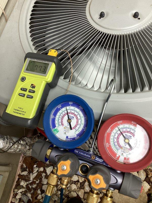 Performed comprehensive AC tune-up on residential condensing unit. Conducted refrigerant pressure diagnostics using manifold gauge set, verified system temperatures with digital thermometer reading 78.3°F, and inspected electrical disconnect and conduit connections. All components operating within normal parameters upon completion of preventive maintenance service.