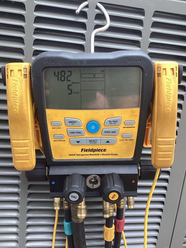 Responded to customer complaint of air conditioning unit making noise. Upon inspection, performed refrigerant pressure diagnostics using manifold gauge set on the basement HVAC system. Verified system pressures and conducted vacuum testing to ensure proper refrigerant charge levels and system integrity, resolving the noise issue related to refrigerant flow irregularities.
