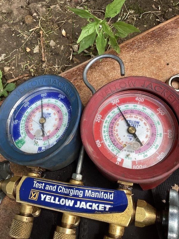 Responded to no cooling call on residential air conditioning system. Upon arrival, located outdoor condenser unit on concrete pad against exterior wall. Connected manifold gauge set to system to diagnose issue. Performed pressure testing and system evaluation to determine cause of cooling failure. Communicated findings and obtained approval to proceed with necessary repairs. System serviced and restored to proper operation.