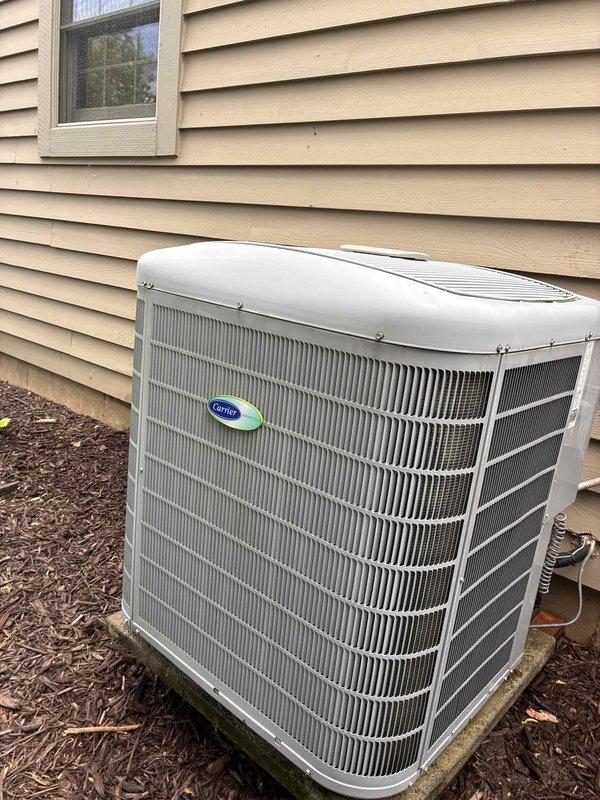 Completed scheduled preventive maintenance cooling visit on Carrier condensing unit as part of prepaid membership agreement. Performed comprehensive system inspection including visual assessment of condenser coil fins, cabinet condition, and refrigerant line connections. Unit found in good operational condition with clean exterior housing, straight condenser fins, and no visible signs of damage, rust, or refrigerant leaks. Condenser coil showed minor debris accumulation between fins typical of normal operation. Equipment positioned properly on concrete pad with adequate clearance from structure and landscaping for proper airflow and serviceability.