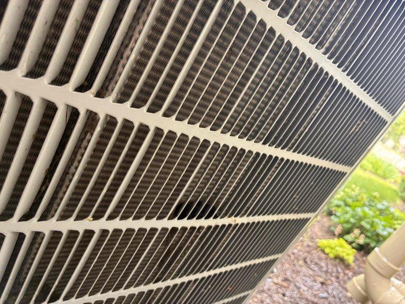 Completed scheduled preventive maintenance cooling visit on Carrier condensing unit as part of prepaid membership agreement. Performed comprehensive system inspection including visual assessment of condenser coil fins, cabinet condition, and refrigerant line connections. Unit found in good operational condition with clean exterior housing, straight condenser fins, and no visible signs of damage, rust, or refrigerant leaks. Condenser coil showed minor debris accumulation between fins typical of normal operation. Equipment positioned properly on concrete pad with adequate clearance from structure and landscaping for proper airflow and serviceability.