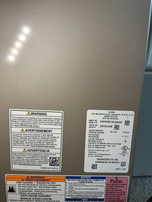 Responded to service call for AC unit leaking issue. Upon arrival, performed system inspection and diagnostics on Carrier CNPVP3617ALA4AA unit containing R-410A refrigerant. Documented unit specifications and current condition with photos for service records.