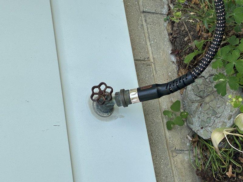 Responded to service call for leaking hose bib. Upon arrival, performed diagnostic inspection of outdoor spigot and traced supply line to shutoff valve located in attic crawl space. Identified source of leak at exterior hose bib connection point. Inspected interior shutoff valve for proper operation and verified water supply control functionality. Documented existing conditions of both exterior spigot assembly and interior valve access point for customer records.