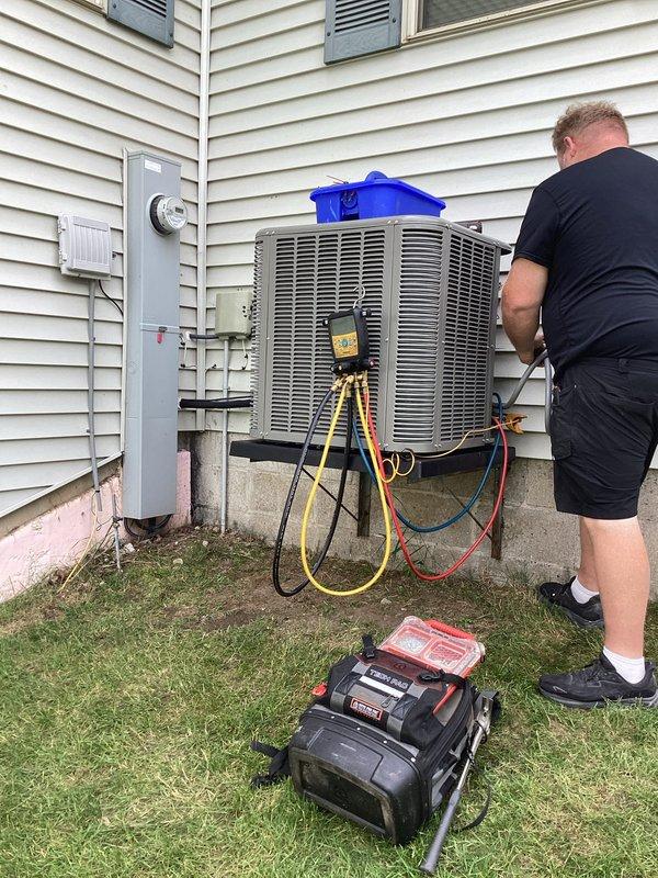Completed full HVAC system installation including new Lennox furnace and air conditioning condenser units. Installed furnace in basement utility area with proper ductwork connections, refrigerant line routing, and PVC venting/drainage system. Set dual outdoor condenser units on concrete pad with electrical disconnect and meter connections, completed refrigerant line installation with proper insulation, and performed system startup and commissioning. All work completed with permits and electrical service coordinated as specified.