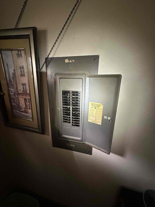 Conducted on-site evaluation for mini split installation in residence without existing ductwork or basement. Assessed electrical service at meter location and main panel to verify capacity for new mini split system. Documented existing electrical infrastructure including meter mounting, service entrance conduit, and available breaker spaces in main distribution panel to determine feasibility of installation and power requirements for proposed ductless heat pump system.