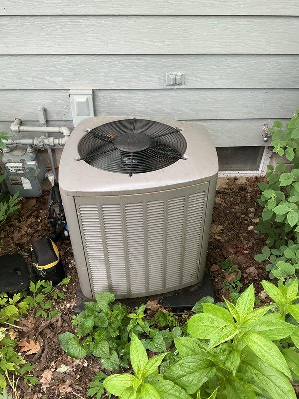 Completed scheduled cooling season maintenance visit on residential air conditioning system. Performed comprehensive tune-up including inspection of outdoor condensing unit, verification of proper operation, and system diagnostics. Unit found in good working condition with appropriate airflow through condenser coils and fan assembly operating normally.
