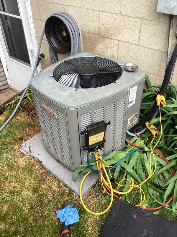 Responded to no cooling complaint on 10+ year old Lennox air conditioning system. Connected refrigerant manifold gauges to assess system pressures and diagnose compressor and refrigerant charge operation. Performed diagnostic testing to determine cause of cooling failure and system performance issues.