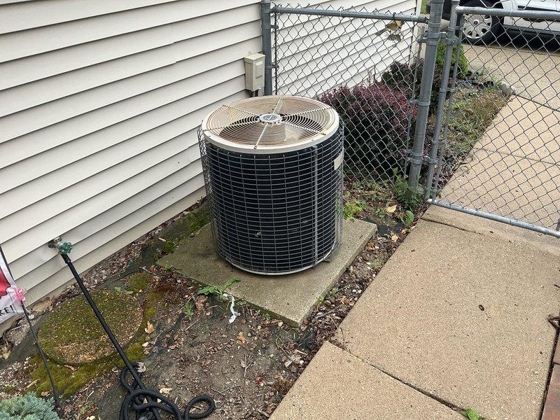 Conducted on-site evaluation for complete HVAC system replacement including furnace located in basement and outdoor air conditioning condenser unit. Assessed existing electrical infrastructure at main panel and documented current equipment conditions to provide comprehensive replacement estimate.