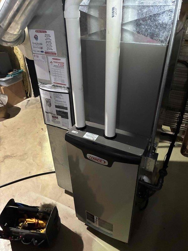 Completed annual air conditioning tune-up on Lennox HVAC system. Performed comprehensive inspection of indoor furnace unit and outdoor condenser, documenting heavy debris accumulation on condenser coil fins requiring cleaning to restore proper airflow and system efficiency. Rescheduled follow-up appointment to complete remaining maintenance tasks.