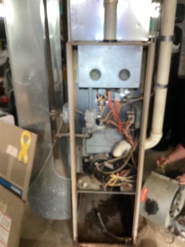 Responded to no cooling complaint on 1980s-era Daikin split system at new service location. Upon arrival, accessed indoor air handler unit and performed visual inspection of internal components. Removed blower compartment access panel to assess blower wheel condition and airflow components. Found significant dust and debris accumulation on squirrel cage blower wheel and throughout cabinet interior, indicating lack of routine maintenance over extended service life. Inspected electrical connections, wiring harnesses, and control components for signs of failure or deterioration. Documented equipment information and current system condition with photographs for service records, as unit age and maintenance history were unknown at this location.