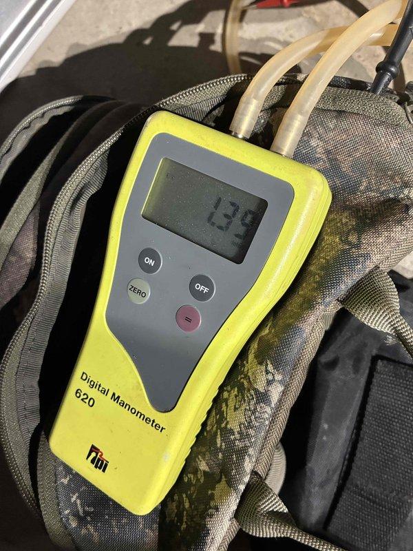 Completed comprehensive AC tune-up on residential condensing unit, including refrigerant pressure verification using manifold gauges and static pressure measurement with digital manometer reading 139. All system parameters checked and confirmed within normal operating range, unit left in proper working condition.