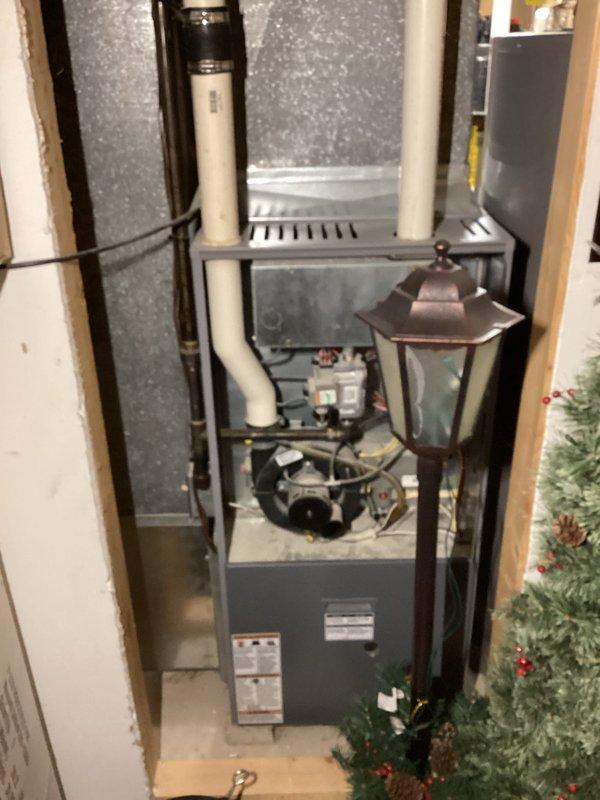 Responded to no cooling complaint on residential HVAC system over 10 years old. Upon arrival, discovered severe electrical failure at outdoor condenser unit with extensive heat damage, burned wiring, and melted insulation throughout the electrical compartment. The condenser's electrical components had catastrophically failed, rendering the unit inoperable and creating a potential safety hazard. Due to the age of the equipment and extent of electrical damage, recommended full system replacement rather than repair. Customer approved replacement of complete HVAC system including outdoor condenser unit and indoor furnace assembly to restore cooling capability and ensure safe, reliable operation.