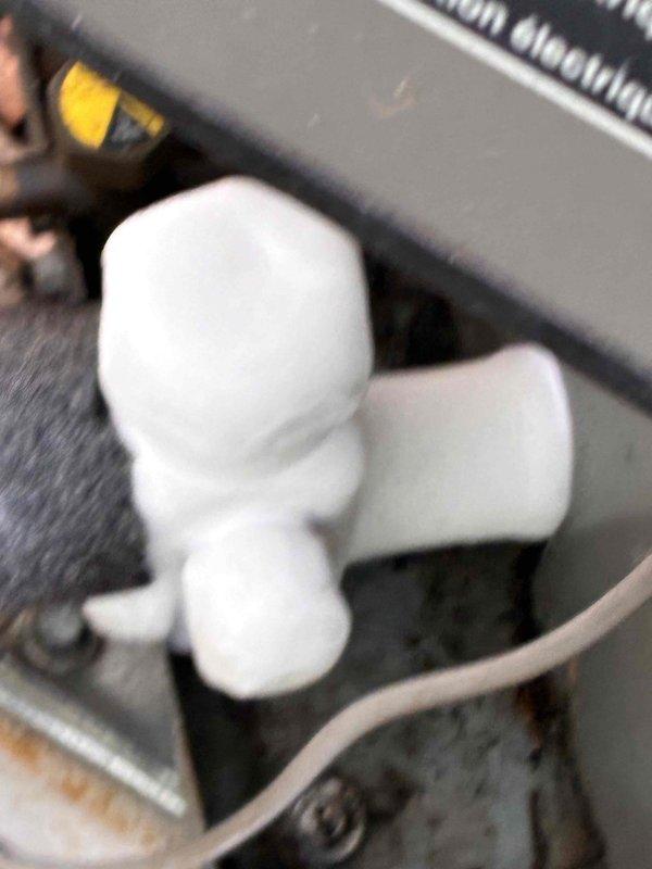 Responded to callback for lower AC unit not cooling. Upon arrival, inspected condensate drain system and found clogged drain line causing system shutdown. Cleared obstruction from PVC drain piping and verified proper drainage flow. Tested unit operation and confirmed system cooling normally. Discussed replacement options with occupant and noted military discount eligibility for future equipment upgrade estimate.