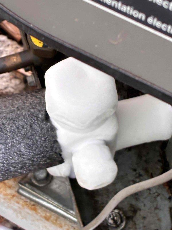 Responded to callback for lower AC unit not cooling. Upon arrival, inspected condensate drain system and found clogged drain line causing system shutdown. Cleared obstruction from PVC drain piping and verified proper drainage flow. Tested unit operation and confirmed system cooling normally. Discussed replacement options with occupant and noted military discount eligibility for future equipment upgrade estimate.