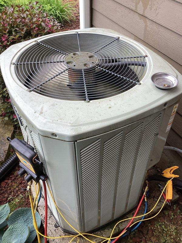 Responded to no cooling complaint on aging residential air conditioning system. Upon arrival, connected manifold gauges to outdoor condenser unit and performed system diagnostics. Inspection revealed dirty evaporator coil with significant dust and debris accumulation restricting airflow, which was contributing to reduced cooling capacity. Assessed overall system condition noting unit age and general wear on outdoor components. Performed necessary testing to determine refrigerant levels and system pressures to evaluate compressor and overall system performance.