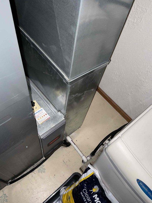 Conducted an indoor air quality assessment and provided estimate for upgrading existing filter cabinet to a SecurAire filtration system to improve dust and allergen protection. Evaluated current HVAC system configuration including furnace/air handler unit and ductwork arrangement in mechanical space to determine compatibility and installation requirements for enhanced air filtration solution.