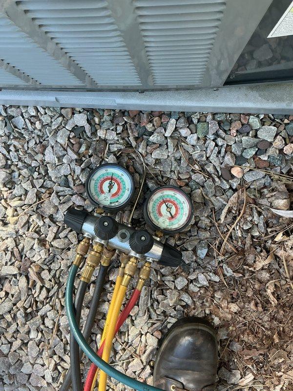 Performed comprehensive air conditioning tune-up on residential HVAC system, including outdoor condensing unit and indoor air handler. Conducted refrigerant pressure testing using manifold gauges to verify proper system charge and operating pressures, inspected all refrigerant lines and connections, and documented equipment model information for service records.