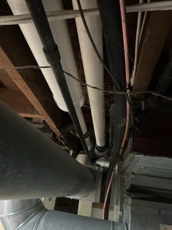Completed comprehensive tune-up on Lennox furnace and air conditioning system. Performed full system inspection including burner assembly, heat exchanger, blower motor, and electrical connections on heating unit. Inspected Space-Gard air filtration system for proper operation. Checked all ductwork connections, PVC intake and exhaust venting, and verified proper drainage. Tested thermostat operation, measured temperature differentials, and confirmed all safety controls functioning correctly. System operating within manufacturer specifications with no deficiencies noted.