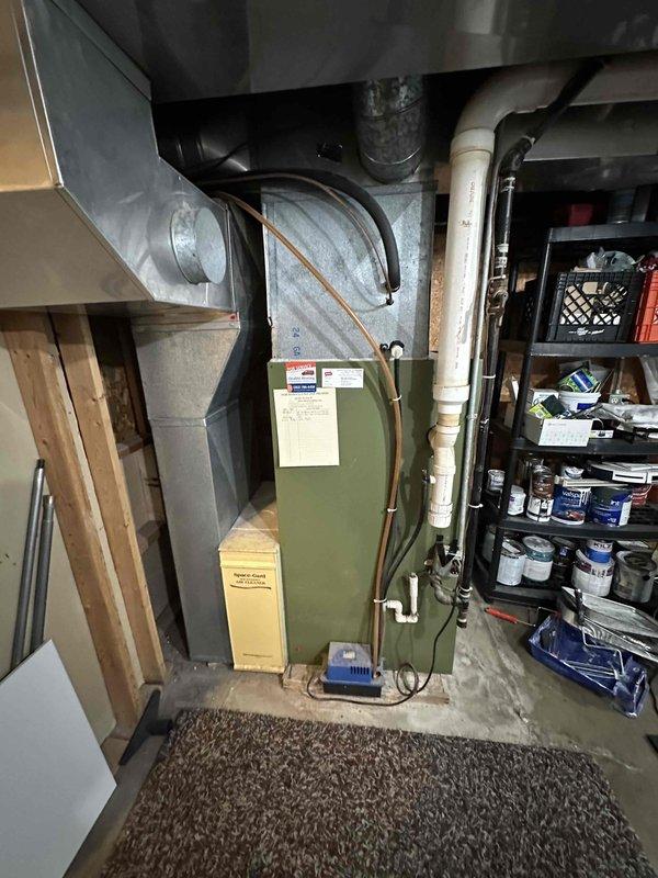 Conducted on-site assessment for mini split installation in residential property. Evaluated existing HVAC infrastructure including furnace unit, ductwork configuration, and available installation locations in basement utility area and attic space. Documented current system layout, structural considerations, and optimal placement options for proposed ductless mini split system to provide supplemental heating and cooling capacity.