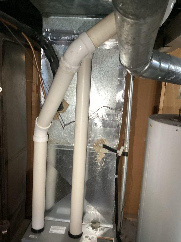 # HVAC No Cool Service Call - 21-Year-Old System

Responded to no cooling complaint on residential air conditioning system approximately 21 years old. Homeowner reported thermostat was set to 70 degrees but indoor temperature continued rising to 77 degrees before system was shut down. Courtesy call made prior to arrival.

Upon arrival, performed comprehensive diagnostic evaluation of aging split system. Outdoor condenser unit showed significant accumulation of dirt, grime, and biological growth on exterior surfaces and protective grilles, indicating extended period without maintenance. Unit positioned on concrete pad showed signs of age-related deterioration. Indoor air handler and associated ductwork inspected in attic space, with PVC condensate lines and refrigerant piping examined for proper operation.

Conducted systematic troubleshooting to identify root cause of cooling failure. Checked electrical components, refrigerant pressures, airflow, and thermostat operation. Based on age 