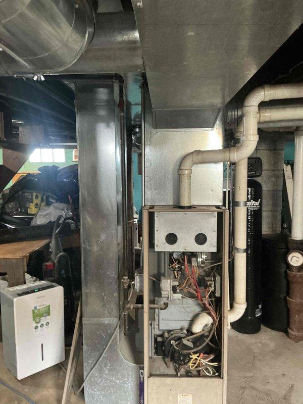 Conducted comprehensive evaluation of existing HVAC system for replacement estimate, including basement-installed furnace and outdoor air conditioning condenser unit. Documented current equipment conditions, ductwork configuration, electrical connections, and installation parameters to provide accurate replacement specifications and scope of work for complete system upgrade.