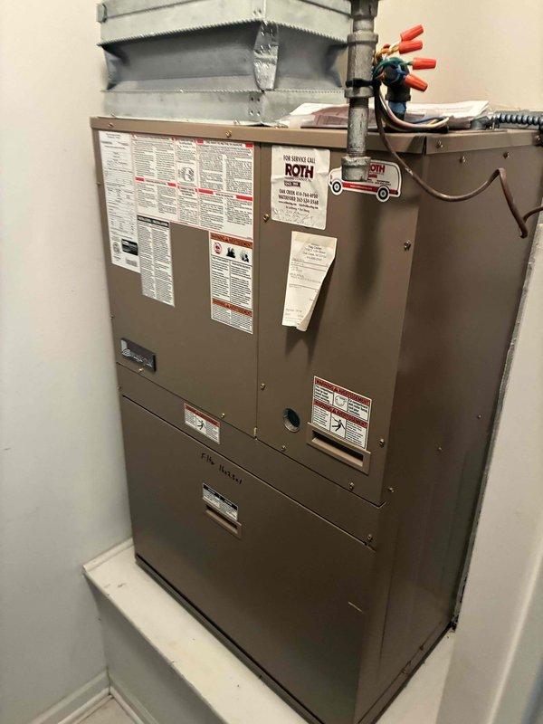 Performed comprehensive tune-up on MagicPak HVAC system, servicing both heating and cooling components. Conducted thorough inspection of cabinet-style unit, verified all manufacturer specifications and safety labels, checked refrigerant levels using manifold gauges, and inspected internal components including blower assembly and condensate management system. All systems tested and operating within normal parameters upon completion.