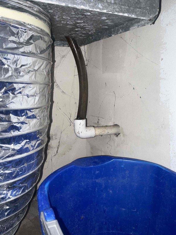 Responded to emergency service call for Magicpak system evaluation and provided comprehensive replacement estimate. Documented existing HVAC installation including flexible ductwork with reflective insulation, condensate drainage system with PVC piping, and collection bucket setup. Assessed system condition, noted wall deterioration in mechanical space, and completed photographic documentation of all components for replacement proposal within specified time window.