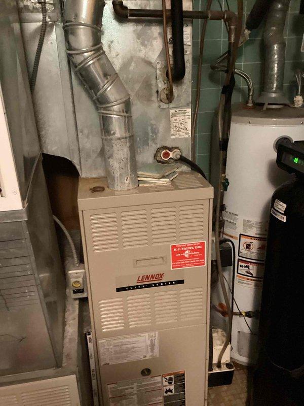 Responded to no cooling call on older residential air conditioning system. Upon arrival, confirmed condenser unit failed to start. Performed diagnostic evaluation to determine root cause of compressor failure. Inspected indoor furnace components and verified proper airflow through system. Documented existing Lennox Pulse Series equipment condition and captured photos of installation for service records. Customer advised of findings and repair options for aging HVAC system.