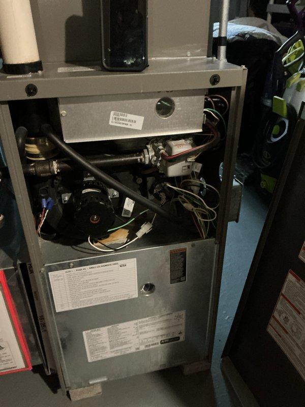 Completed comprehensive tune-up service on residential HVAC system including both furnace and air conditioning units. Performed visual inspection of furnace internal components including blower motor, gas valve assembly, ignition system, and electrical connections with access panel removed. Conducted refrigerant pressure testing on AC system using manifold gauges to verify proper system charge and operation.