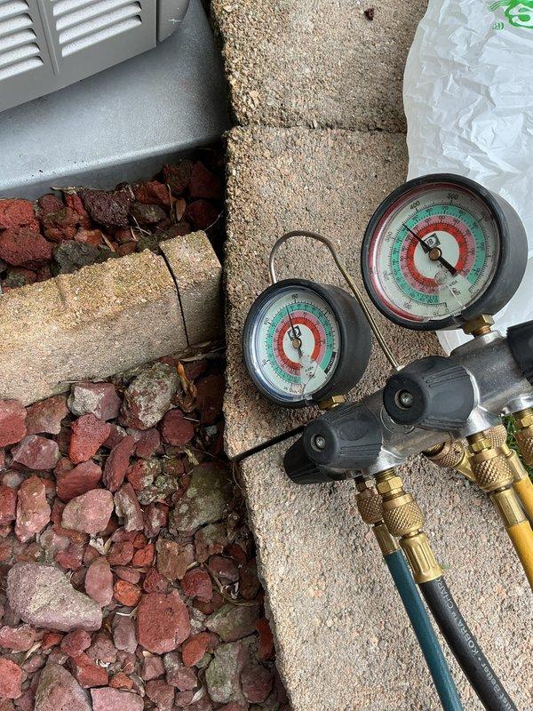 Completed comprehensive tune-up service on residential HVAC system including both furnace and air conditioning units. Performed visual inspection of furnace internal components including blower motor, gas valve assembly, ignition system, and electrical connections with access panel removed. Conducted refrigerant pressure testing on AC system using manifold gauges to verify proper system charge and operation.