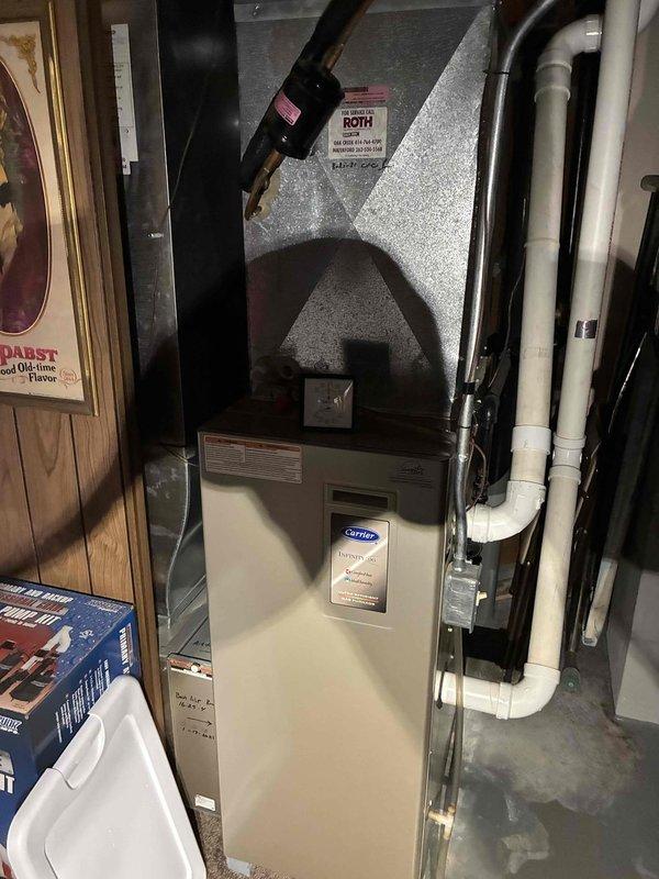 Responded to no cooling complaint on Carrier split system. Upon arrival, diagnosed thermostat thermal lockout which had caused the air conditioning system to shut down. Reset thermostat and verified proper system operation. Inspected outdoor condensing unit and indoor air handler, confirming both components returned to normal cooling mode. System tested and operating within manufacturer specifications at time of departure.