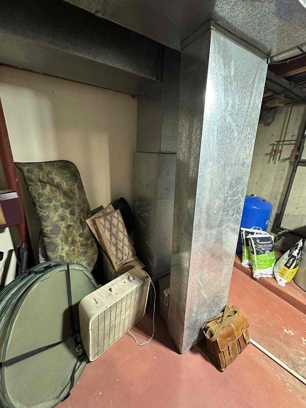 Provided estimate for replacement of 26-year-old air handler unit located in basement that has stopped working. Assessed existing HVAC system, documented current equipment condition, and photographed installation area including ductwork connections and electrical components to prepare comprehensive replacement proposal.