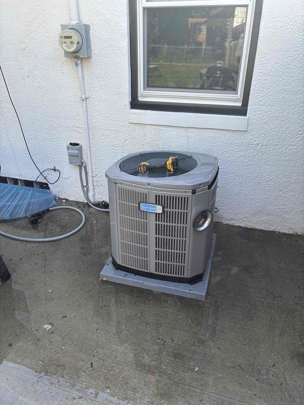 Completed comprehensive A/C tune-up on residential outdoor condensing unit. Performed standard preventative maintenance including system inspection, refrigerant line check, electrical connection verification, and thermostat functionality test. Unit operating within normal parameters; Honeywell digital thermostat functioning properly with system holding temperature setpoint as programmed.