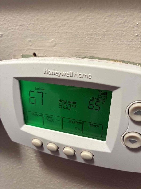 Completed comprehensive A/C tune-up on residential outdoor condensing unit. Performed standard preventative maintenance including system inspection, refrigerant line check, electrical connection verification, and thermostat functionality test. Unit operating within normal parameters; Honeywell digital thermostat functioning properly with system holding temperature setpoint as programmed.