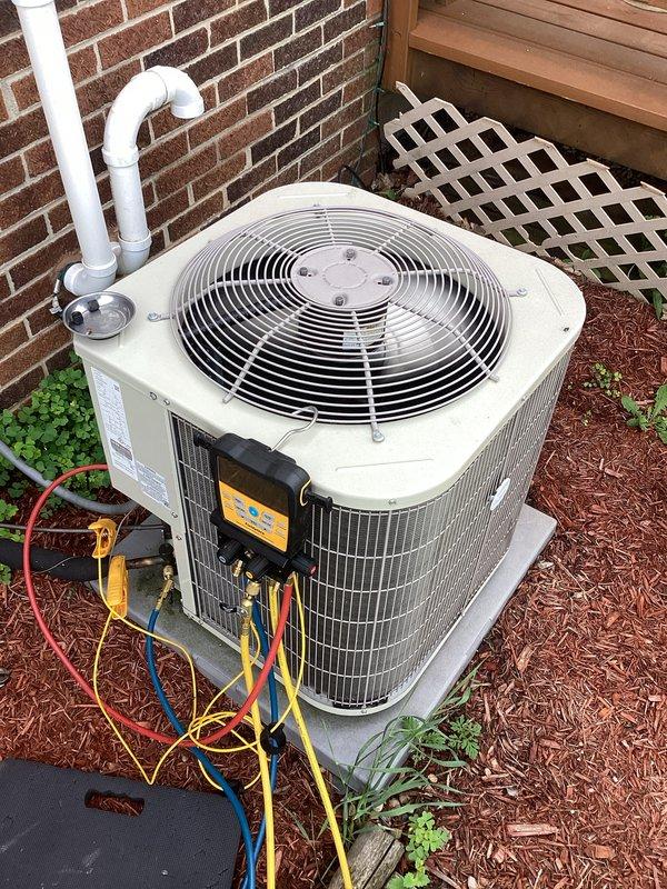 Performed diagnostic service on residential air conditioning system. Connected manifold gauges to outdoor condenser unit to check refrigerant pressures and system performance. Utilized inspection camera to examine interior ductwork and HVAC components for potential issues or obstructions. System evaluation completed with diagnostic equipment to ensure proper operation.