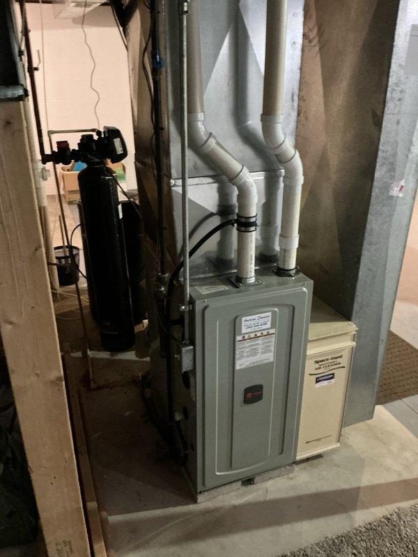 Responded to emergency service call and conducted on-site assessment for air conditioning system replacement. Evaluated existing HVAC equipment in mechanical room, documented current system configuration including air handler unit, electrical panel, and associated plumbing connections, and provided comprehensive replacement estimate for new AC system installation.
