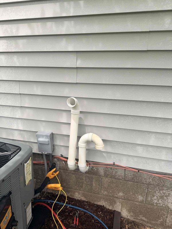 Completed comprehensive air conditioning tune-up and system evaluation on outdoor condenser unit. Connected diagnostic gauges to assess refrigerant pressures and system performance, initiated new maintenance membership for ongoing service coverage. All components functioning properly with no issues identified during inspection.