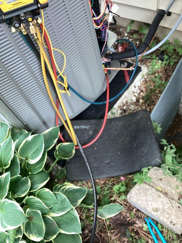 Completed full HVAC system installation including new air conditioning condenser unit and evaporator coil. Installation performed with proper permitting and licensed electrician on site. Established dedicated electrical service with new disconnect panel and exterior junction box, running conduit from main panel to unit location. Mounted condenser on protective pad with proper clearances from building structure. Connected refrigerant lines using industry-standard copper linesets, installed control wiring, and completed all electrical terminations per code requirements. System tested and charged to manufacturer specifications, verifying proper operation of all components and controls.