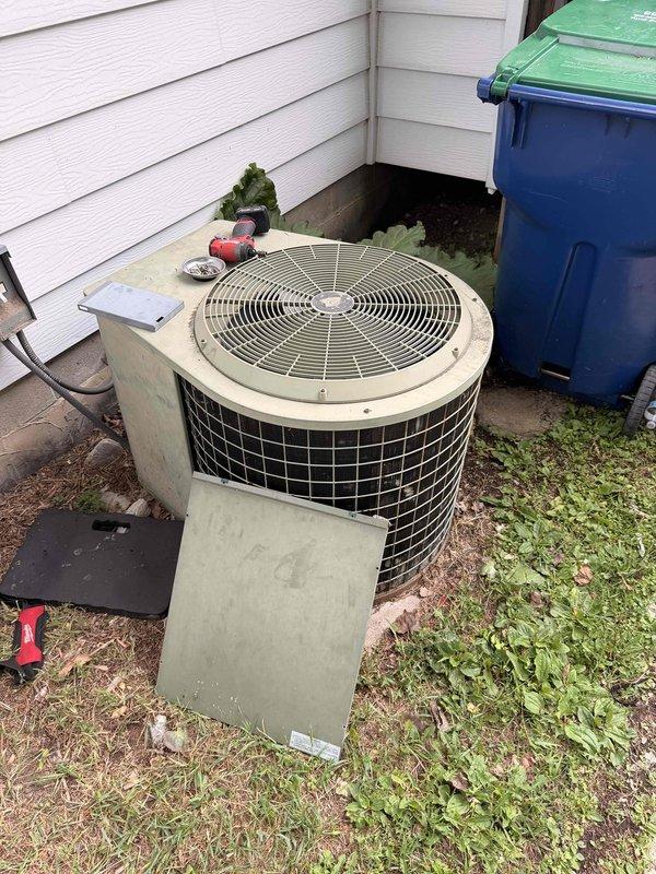Responded to no cooling call on aging residential split system. Upon arrival, found outdoor condensing unit inoperative with visible signs of weathering and corrosion on electrical components. Performed diagnostic testing, identified failed contactor and capacitor due to age-related deterioration, and completed necessary repairs to restore cooling operation.