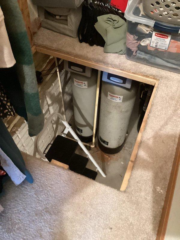 Responded to no cooling complaint on residential HVAC system. Upon arrival, located air handler unit in basement mechanical room and performed diagnostic evaluation of equipment over 10 years old. Documented existing system configuration including ductwork connections and refrigerant line routing. Captured photos of equipment location and surrounding mechanical area for service records.