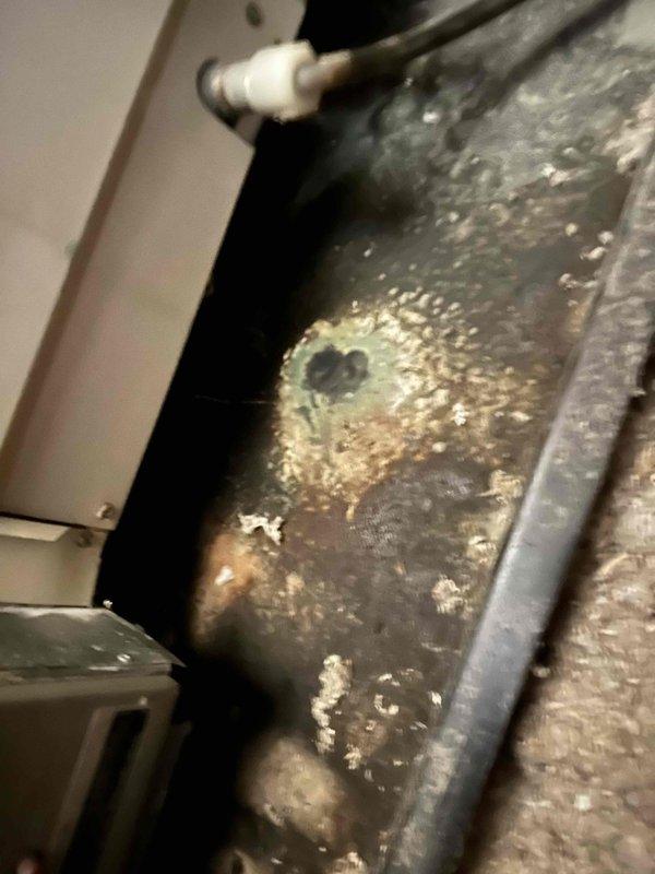Conducted comprehensive estimate for attic air handler replacement due to severe system deterioration. Inspection revealed extensive corrosion and rust on existing ductwork and metal components, with significant oxidation, mineral deposits, and moisture damage indicating prolonged environmental exposure and compromised system integrity. Documented current HVAC system condition including corroded metal panels, aged flexible ductwork, and existing air handler unit, and provided replacement recommendations to restore proper heating and cooling functionality.