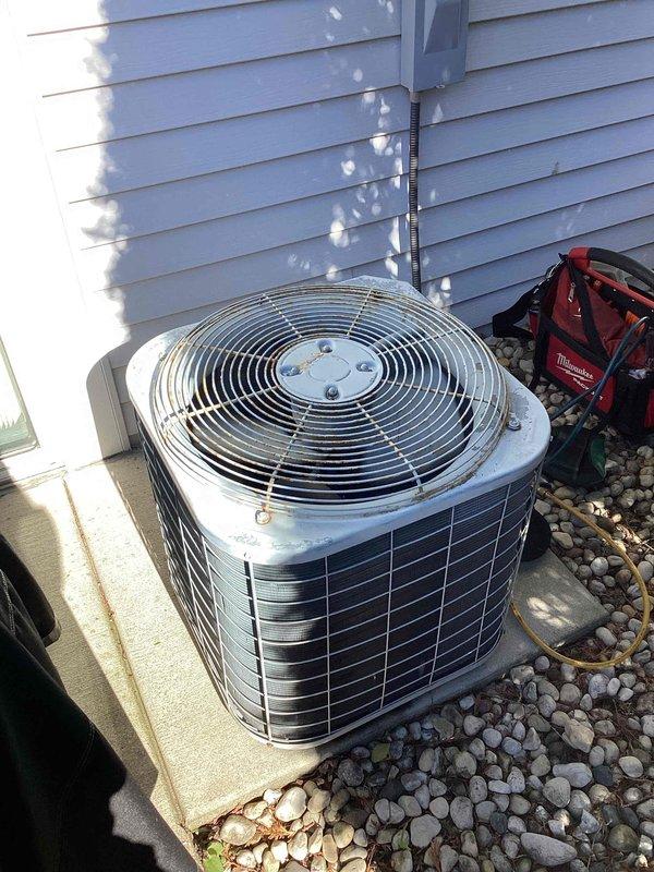 Responded to no cooling complaint on residential split system. Upon arrival, diagnosed issue and determined thermostat belt indication was erroneous, as modern residential AC systems do not utilize belts. Inspected outdoor condenser unit and indoor air handler system, verified all components operational, and confirmed system functionality. Educated homeowner on proper system operation and thermostat indicators.