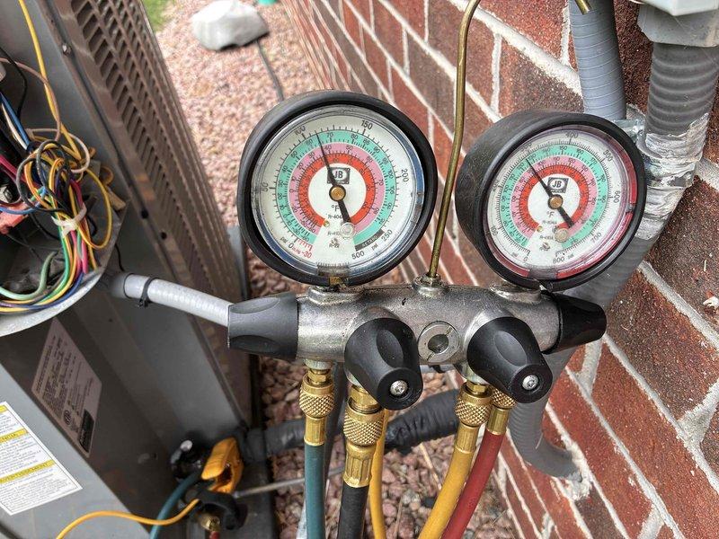 Completed scheduled cooling system maintenance visit as part of prepaid membership plan. Performed comprehensive air conditioning tune-up including refrigerant pressure diagnostics using manifold gauge set, temperature differential measurements across evaporator coil, and visual inspection of outdoor condensing unit components. All system parameters found within normal operating specifications, with unit functioning properly upon completion of preventive maintenance service.