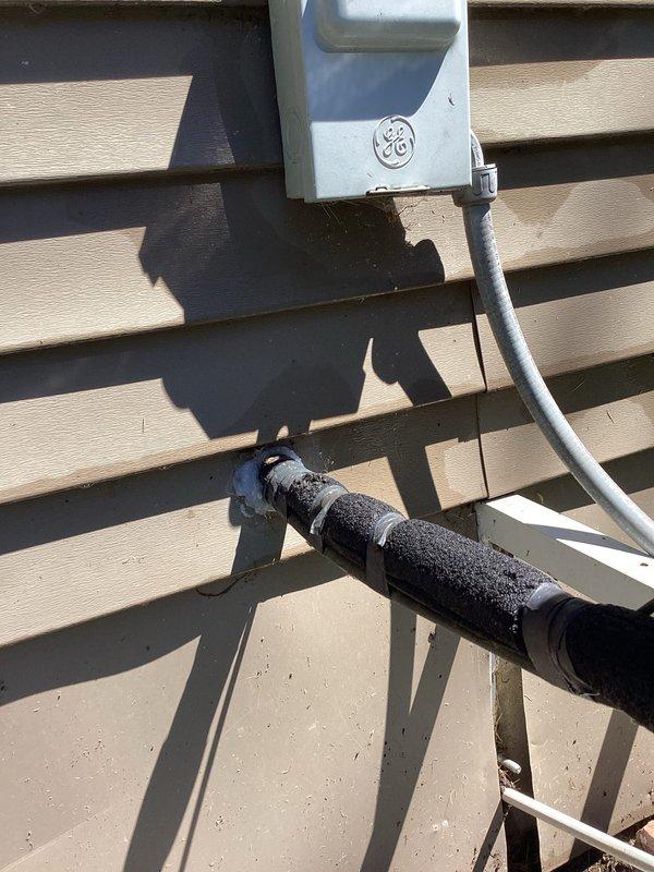 Completed routine membership cooling system maintenance visit. Performed comprehensive inspection of outdoor condensing unit including electrical disconnect, refrigerant line insulation, and associated conduit work. Inspected indoor air handler components and return air grille, noting dust accumulation on filter mesh requiring attention during preventative maintenance protocol.