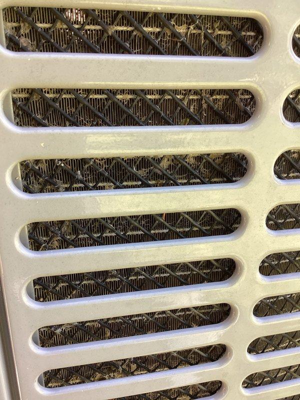 Completed routine membership cooling system maintenance visit. Performed comprehensive inspection of outdoor condensing unit including electrical disconnect, refrigerant line insulation, and associated conduit work. Inspected indoor air handler components and return air grille, noting dust accumulation on filter mesh requiring attention during preventative maintenance protocol.