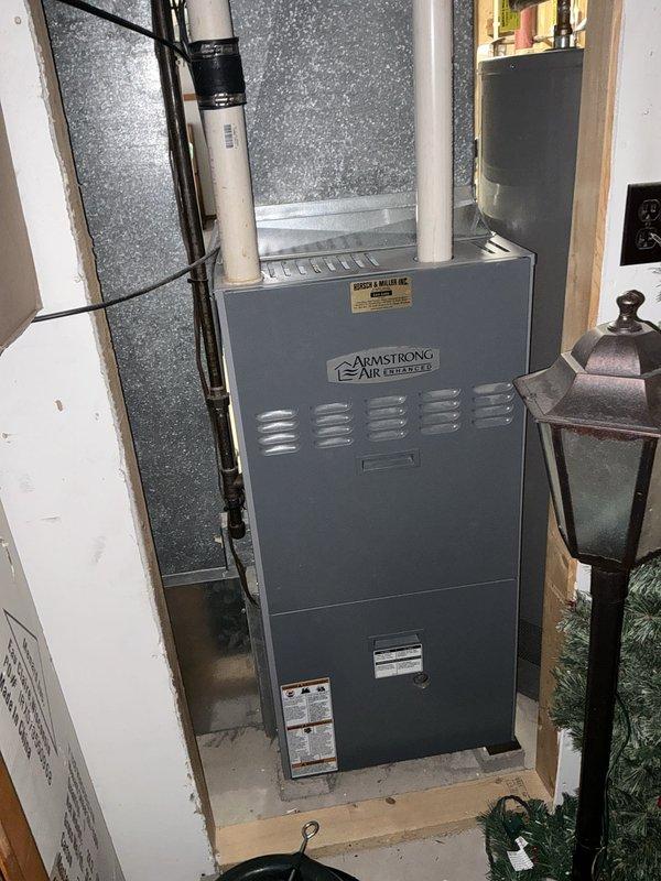 Conducted comprehensive HVAC system evaluation for complete replacement estimate at residential property. Assessed existing Armstrong Air furnace and outdoor condensing unit, documented current equipment specifications, measured installation space, evaluated ductwork and electrical infrastructure, and photographed both indoor and outdoor components to provide accurate replacement recommendations and system sizing requirements.