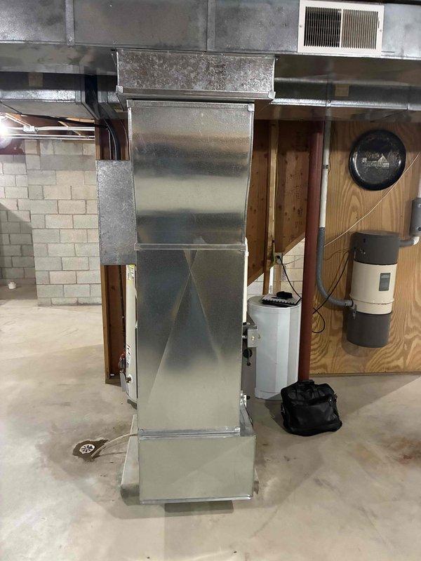 Conducted comprehensive estimate for complete HVAC system replacement including air conditioning unit and gas furnace in basement installation. Assessed existing equipment configuration, ductwork connections, and electrical requirements; documented current system layout with photographs and discussed military discount options with homeowner.
