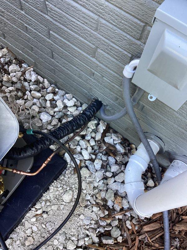 Completed full HVAC system installation including new air conditioning condenser unit and evaporator coil. Flushed existing refrigerant line set to remove contaminants and ensure system integrity. Installed new refrigerant lines with proper insulation and secured all copper piping with brass fittings. Configured exterior PVC condensate drainage system with appropriate pitch and connections. Coordinated with licensed electrician for electrical disconnects and power supply connections. Pulled necessary municipal permits for installation. Pressure tested system, evacuated lines, and charged unit to manufacturer specifications. Verified proper superheat and subcooling readings using digital manifold gauges, confirming optimal refrigerant charge and system performance. All components secured to building exterior with proper mounting hardware and weatherproofing. System operational and running within normal parameters upon completion.