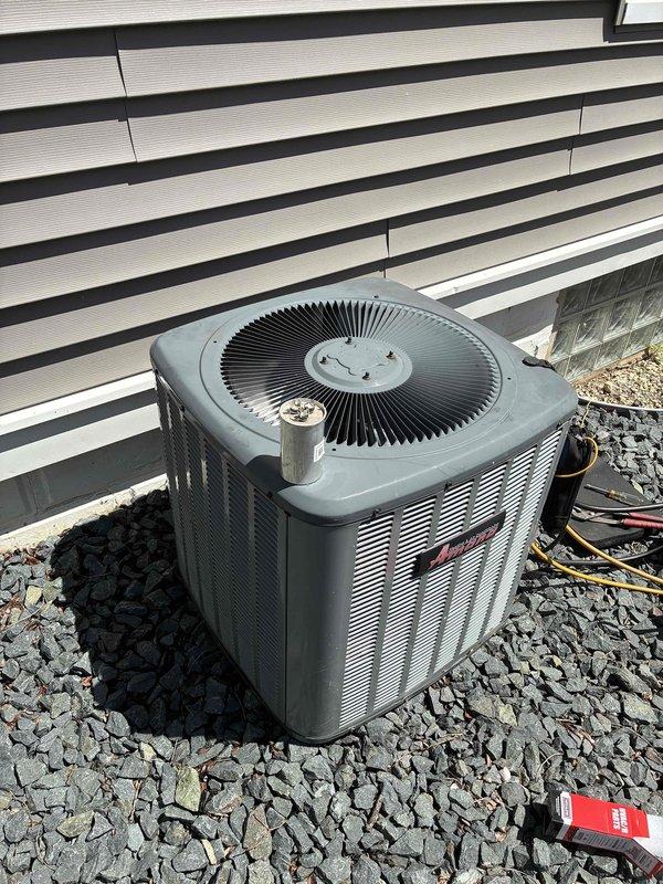 # HVAC Service Report

Responded to no cooling complaint on residential air conditioning system. Upon arrival, found outdoor condenser unit operational but system not providing adequate cooling to structure. Connected manifold gauge set to service ports and performed refrigerant pressure diagnostics. Measured system pressures on both high and low sides to determine operating conditions. Utilized digital testing equipment to assess electrical components and system performance parameters.

Based on diagnostic findings, system showed signs of refrigerant-related issues affecting cooling capacity. Given the age of the unit (10+ years), evaluated overall system condition including condenser coil, fan operation, and refrigerant line integrity. Discussed findings and available options with customer regarding repair versus replacement considerations for aging equipment. System requires further service to restore proper cooling function.